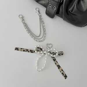 Trendy multi-layer silver metal chain and pearl bow bag charms for handbag decoration