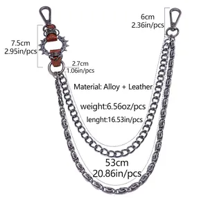 Detail view of punk metal pants chain with spikes and leather accents