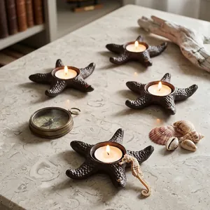 Decorative vintage cast iron starfish tealight candle holder for nautical themed home