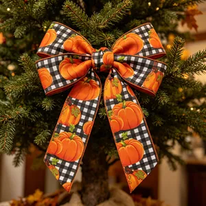 Detailed view of harvest pumpkin checkered bow on autumn themed decorative ribbon decor