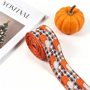 Close-up of harvest theme linen ribbon with pumpkin and plaid patterns