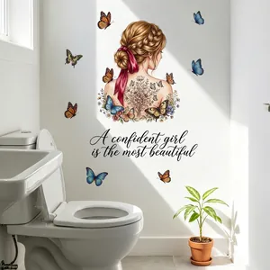 Détail du sticker mural papillon avec silhouette de fille dans une salle de bain.
