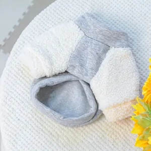 Detail shot of a cozy grey and white sherpa fleece pet sweater for small dogs and cats