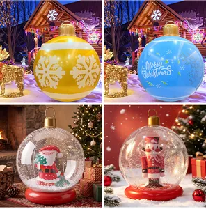 Detailed view of various inflatable Christmas balls with snowflake and festive patterns.