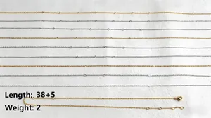 Detailed view of multiple slim titanium steel chains in gold and silver for DIY jewelry.