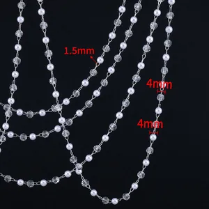 Macro view of 4mm pearls and 1.5mm silver chain for DIY jewelry making accessories
