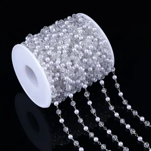 Macro view of 4mm white pearl and crystal bead chain for DIY jewelry making