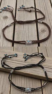 Handmade braided Tibetan ethnic hair rope with turquoise inlay and blue beaded tassels