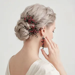 Detailed view of handmade bridal hair comb set featuring elegant red and black crystal beads