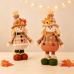 Thanksgiving scarecrow gnome dolls with maple leaf and sunflower hats for harvest decor.