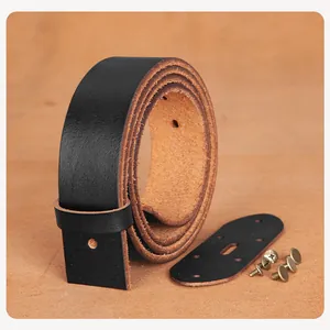 Detailed view of a premium black top-layer cowhide leather belt strap with assembly hardware