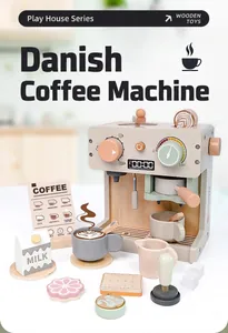 Detailed view of a wooden toy espresso machine set with cups and role-play accessories for kids.