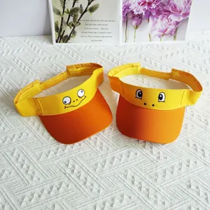 Cartoon embroidered sun visor hats with funny eyes design in yellow and orange