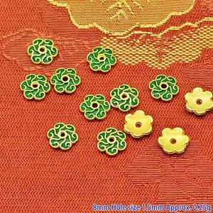 Detailed view of 8mm green enamel alloy flower bead caps and spacers for DIY jewelry making