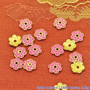 Detailed view of 8mm pink enamel flower spacer beads with 1.5mm hole for DIY beading
