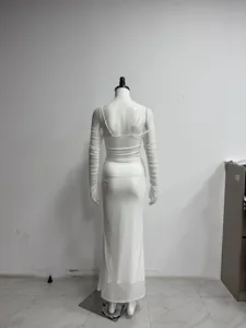 Detailed back view of a white mesh off-shoulder ruched maxi dress with backless design