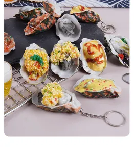 Detailed macro view of realistic PVC oyster keychain with garlic and sauce toppings