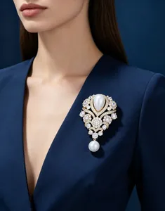 Elegant French vintage waterdrop pearl brooch with diamonds pinned on a navy blazer