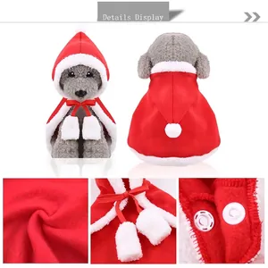 Detailed view of red Christmas dog cloak with soft fleece texture and snap buttons