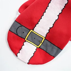 Close-up detail of red Christmas dog sweater featuring Santa belt and fuzzy trim design.