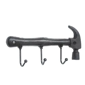 Antique cast iron hammer shaped wall hook with three sturdy hooks for industrial decor