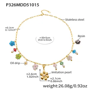Detailed view of colorful stainless steel necklace with resin mushroom and flower charms