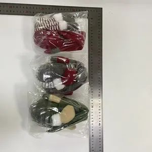 Detailed size measurement photo of three Nordic Christmas faceless plush gnome dolls