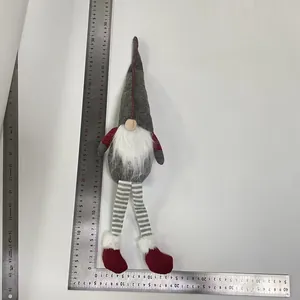 Detailed size measurement view of the Christmas gnome doll height with a professional ruler