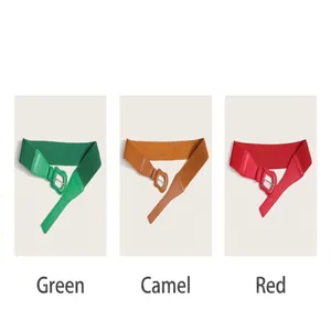 Detailed view of women's elastic waist belt options in green, tan, and red colors