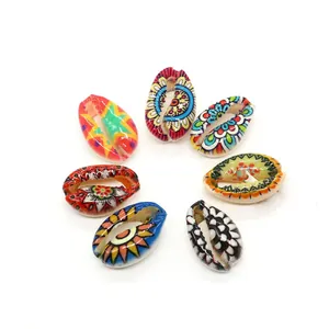 Set of 7 painted natural cowrie shell beads with colorful mandala and floral patterns