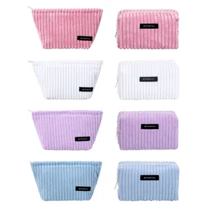 Multi-color corduroy makeup storage bags in various shapes and pastel colors