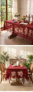 Elegant red lace tablecloth with embossed floral patterns for rustic dining rooms