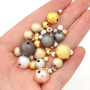 Close-up of frosted copper spacer beads in gold silver and rose gold for DIY jewelry