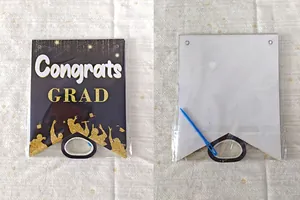 Front and back view of 2026 graduation party banner pennant with blue needle and black ribbon