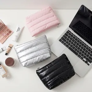 Large capacity minimalist quilted makeup bags in pink, silver, and black for travel storage