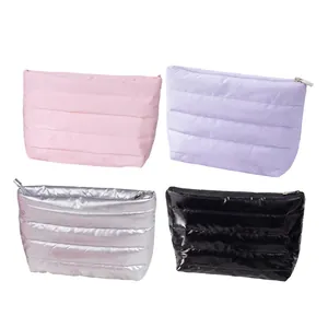 Large capacity quilted makeup storage bags in four colors with durable zipper closure.