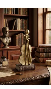 Retro antique finish violin sculpture on a classic book base for home and office decor