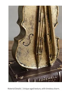 Close-up detail of vintage musical instrument ornament with a distressed metallic finish.