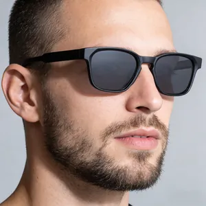 Side view of modern square sunglasses on male model for outdoor fashion street style