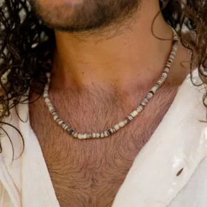 Detailed close-up view of men's beaded necklace with black and gray natural agate beads.