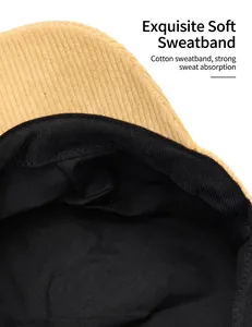 A detail view showing the soft cotton sweatband inside a yellow corduroy flat hat