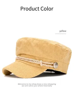 Classic yellow corduroy flat top navy cap with rope decoration and metal button detail