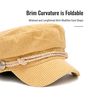 Corduroy navy style flat top cap with decorative rope and foldable brim