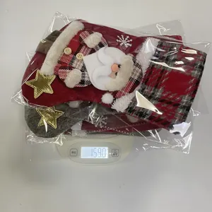 Weight measurement of red plaid Christmas stocking gift bag in package