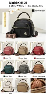 Fashionable round women's crossbody handbag with wide shoulder strap in various colors
