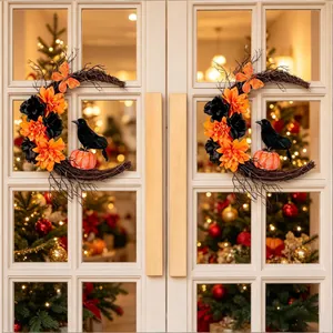 Symmetrical Halloween crescent moon wreaths with black crows on white glass doors