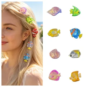 Detailed view showing colorful acetate ocean animal hair clips in various fish shapes