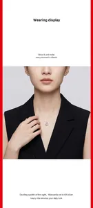 Close-up of a model wearing a minimalist moissanite mermaid tear necklace on an invisible line.