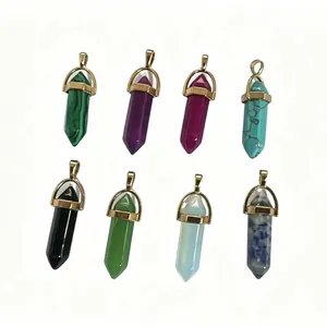 Set of eight multi-colored hexagonal crystal point bullet pendants with gold caps