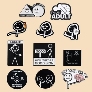 Detailed view of black and white stickman enamel pins set with humorous English quotes